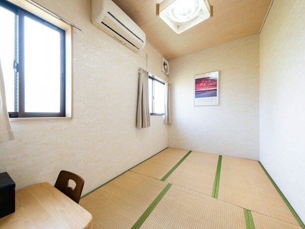 Imagen de la habitación del Hotel Tabist Fuji Sakura Onsen Ryokan. Foto 13