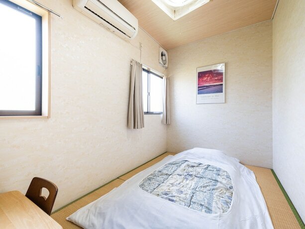 Imagen de la habitación del Hotel Tabist Fuji Sakura Onsen Ryokan. Foto 14