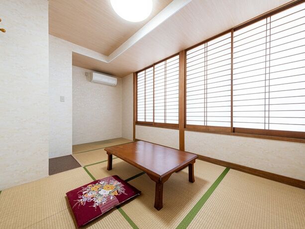 Imagen de la habitación del Hotel Tabist Fuji Sakura Onsen Ryokan. Foto 15