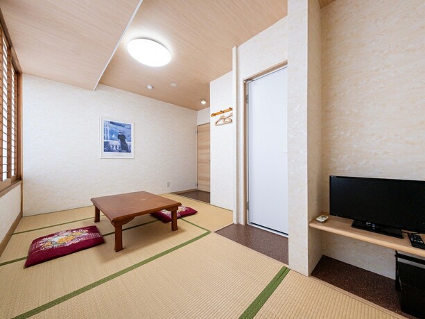 Imagen de la habitación del Hotel Tabist Fuji Sakura Onsen Ryokan. Foto 18