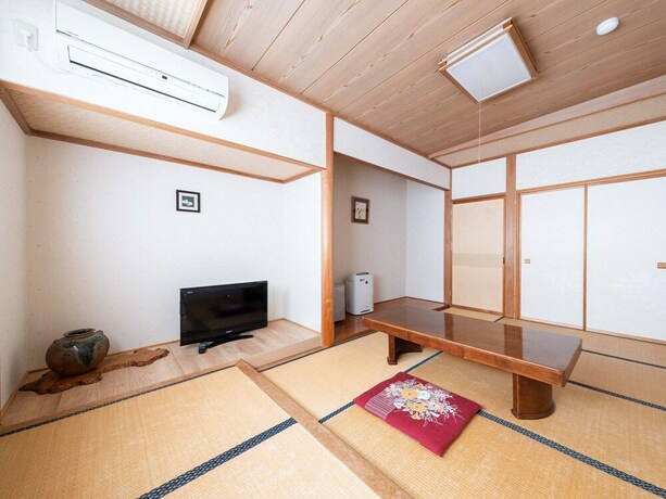 Imagen de la habitación del Hotel Tabist Fuji Sakura Onsen Ryokan. Foto 20