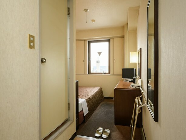 Imagen de la habitación del Hotel Tabist Kameyama Daiichi. Foto 17