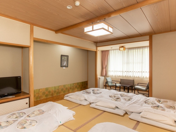 Imagen de la habitación del Hotel Tabist Koboshi No Yu Senshintei Aizu Yunokami Onsen. Foto 3