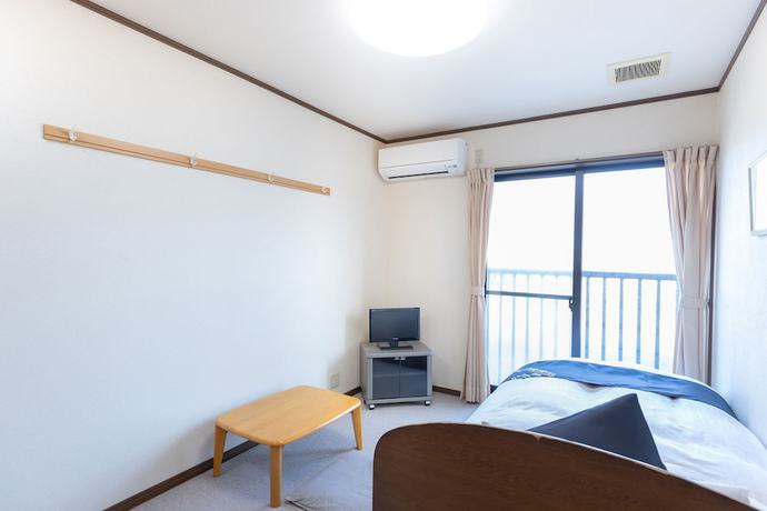Imagen de la habitación del Hotel Tabist Minshuku Minami Hakui. Foto 2