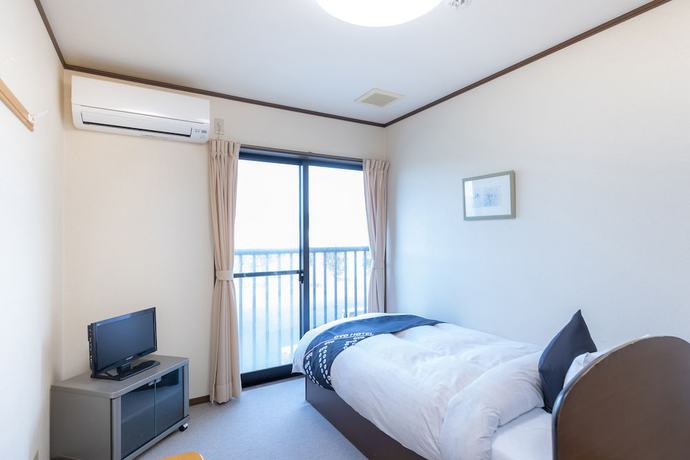 Imagen de la habitación del Hotel Tabist Minshuku Minami Hakui. Foto 5