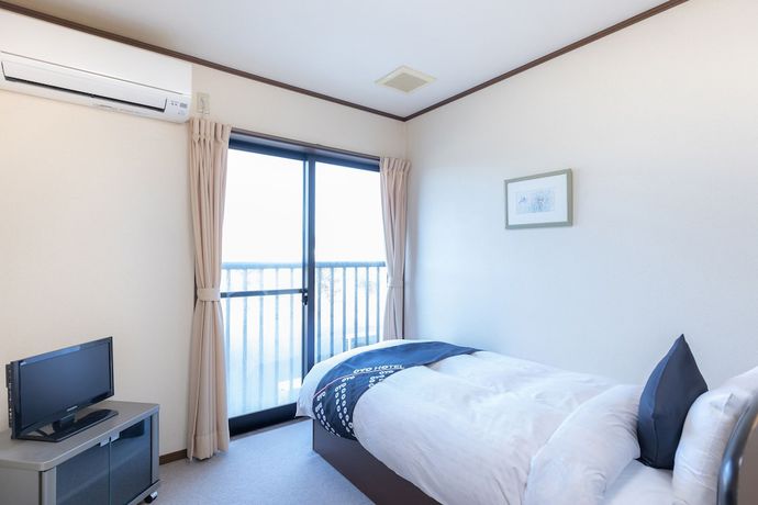 Imagen de la habitación del Hotel Tabist Minshuku Minami Hakui. Foto 6