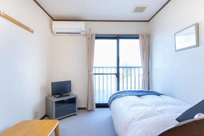 Imagen de la habitación del Hotel Tabist Minshuku Minami Hakui. Foto 8