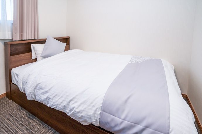 Imagen de la habitación del Hotel Tabist Miya Yokkaichi Suizawa. Foto 13