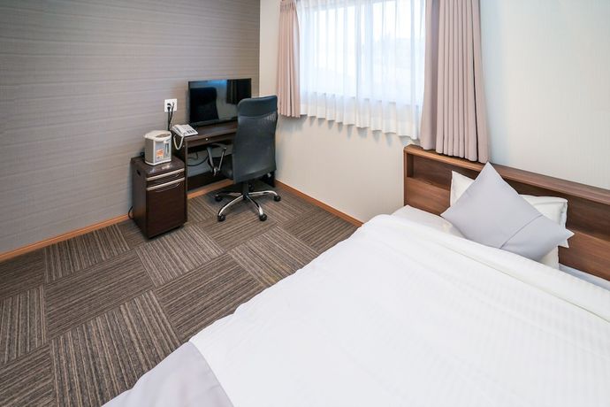 Imagen de la habitación del Hotel Tabist Miya Yokkaichi Suizawa. Foto 14