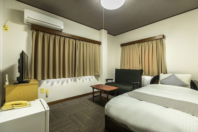 Imagen de la habitación del Hotel Tabist Miya Yokkaichi Suizawa. Foto 18