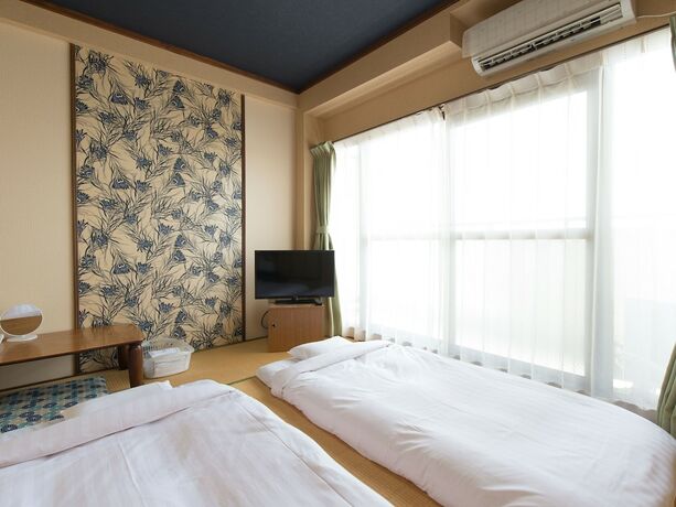 Imagen de la habitación del Hotel Tabist Nisseiya Beppu Kannawa. Foto 18