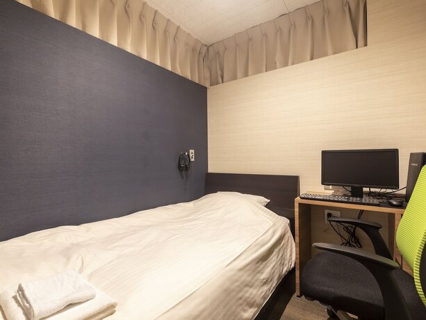 Imagen de la habitación del Hotel Tabist Smart Sleeps Oita Station. Foto 18