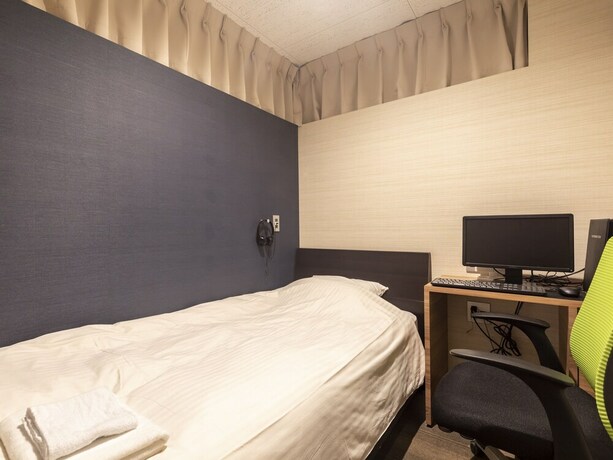 Imagen de la habitación del Hotel Tabist Smart Sleeps Oita Station. Foto 25