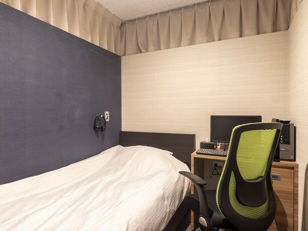 Imagen de la habitación del Hotel Tabist Smart Sleeps Oita Station. Foto 26