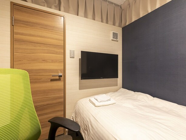 Imagen de la habitación del Hotel Tabist Smart Sleeps Oita Station. Foto 29