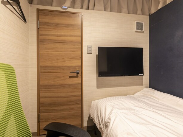 Imagen de la habitación del Hotel Tabist Smart Sleeps Oita Station. Foto 30