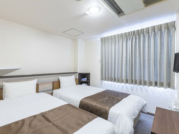 Imagen de la habitación del Hotel Tabist business hotel New Gekkoen. Foto 17