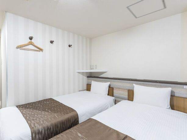 Imagen de la habitación del Hotel Tabist business hotel New Gekkoen. Foto 19