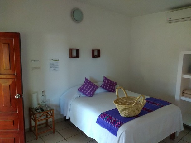 Imagen de la habitación del Hotel Taboga Eco Boutique. Foto 8