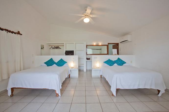 Imagen de la habitación del Hotel Taboga Eco Boutique. Foto 9