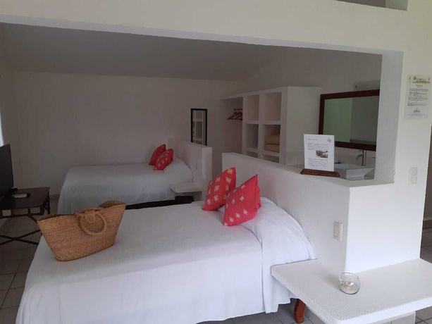 Imagen de la habitación del Hotel Taboga Eco Boutique. Foto 10