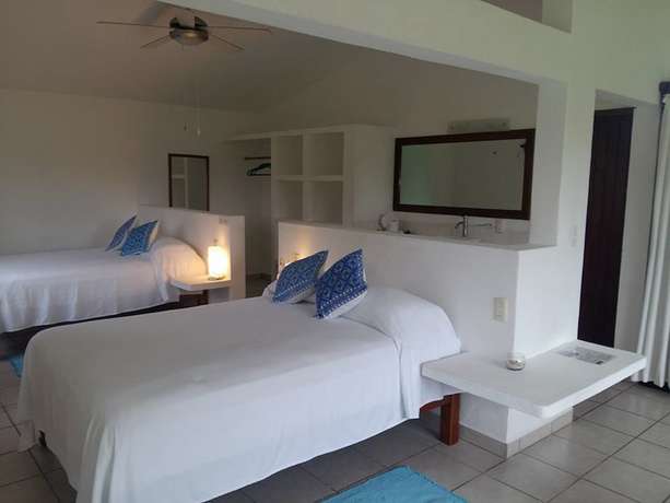 Imagen de la habitación del Hotel Taboga Eco Boutique. Foto 11