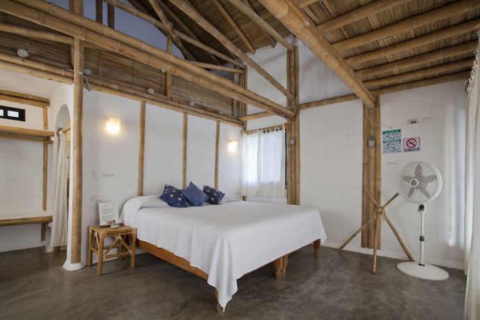 Imagen de la habitación del Hotel Taboga Eco Boutique. Foto 16