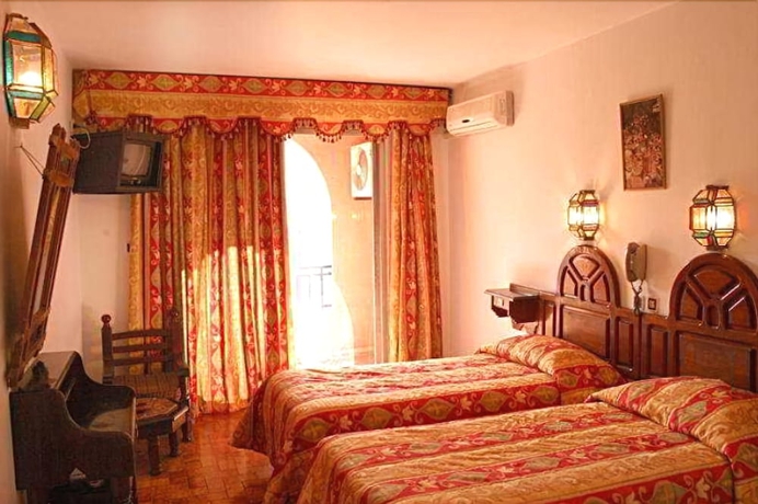 Imagen de la habitación del Hotel Tachfine. Foto 8