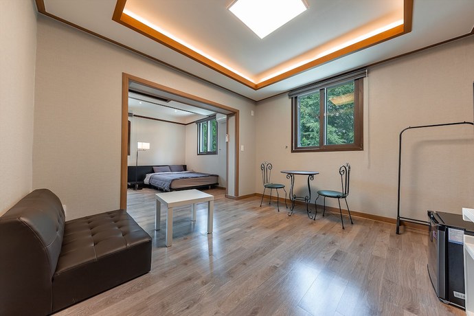 Imagen de la habitación del Hotel Taean Famillie Boutique. Foto 10