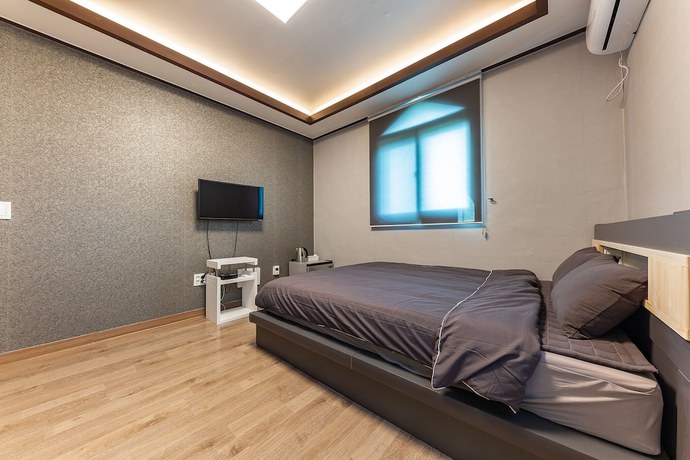 Imagen de la habitación del Hotel Taean Famillie Boutique. Foto 11