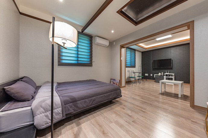 Imagen de la habitación del Hotel Taean Famillie Boutique. Foto 12