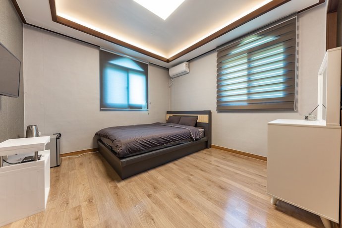 Imagen de la habitación del Hotel Taean Famillie Boutique. Foto 16