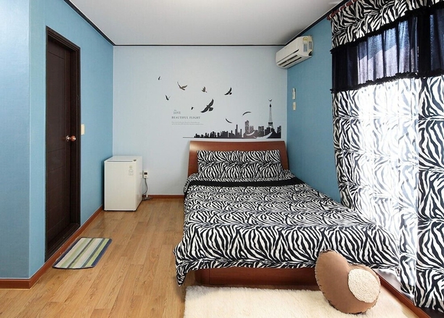 Imagen de la habitación del Hotel Taean W Pension. Foto 18