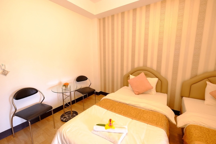 Imagen de la habitación del Hotel Tafah Residence. Foto 9