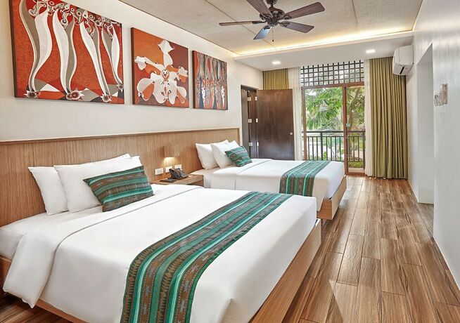 Imagen de la habitación del Hotel Tag Resort. Foto 14