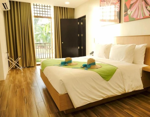 Imagen de la habitación del Hotel Tag Resort. Foto 15