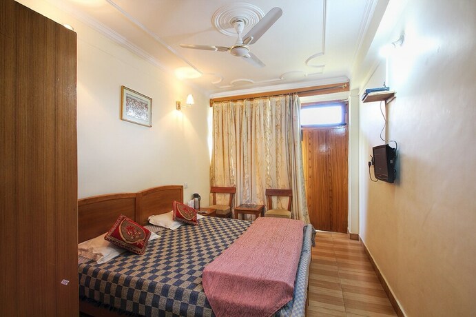 Imagen de la habitación del Hotel Tag Resorts Lavanya, Bhimtal. Foto 8