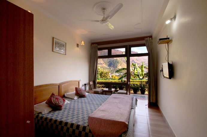 Imagen de la habitación del Hotel Tag Resorts Lavanya, Bhimtal. Foto 16