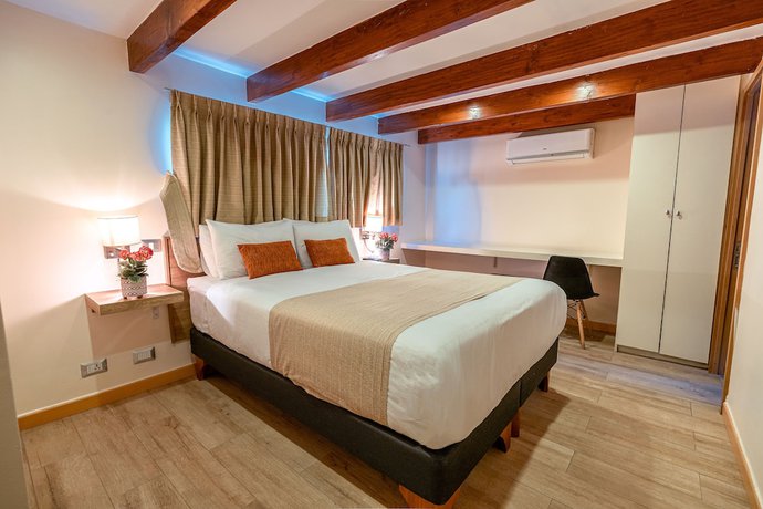 Imagen de la habitación del Hotel Tagle Boutique. Foto 16