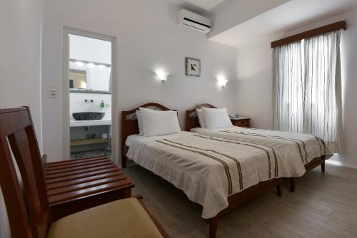 Imagen de la habitación del Hotel Tagoo, Mikonos Ciudad. Foto 2