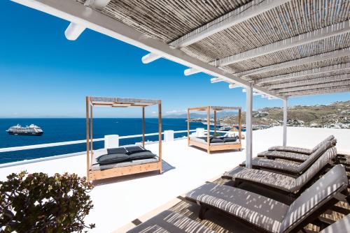 Imagen de los interiores del Hotel Tagoo, Mikonos Ciudad. Foto 8