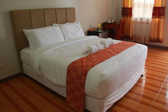 Imagen de la habitación del Hotel Tagum Coop Budgetel. Foto 10