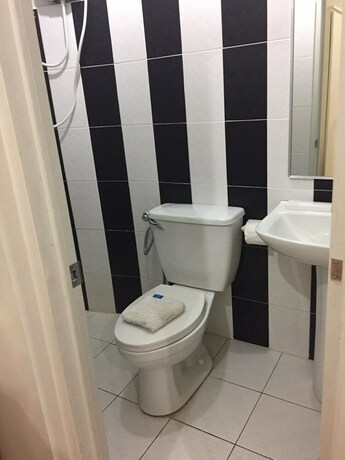 Imagen de la habitación del Hotel Tagum Coop Budgetel. Foto 11