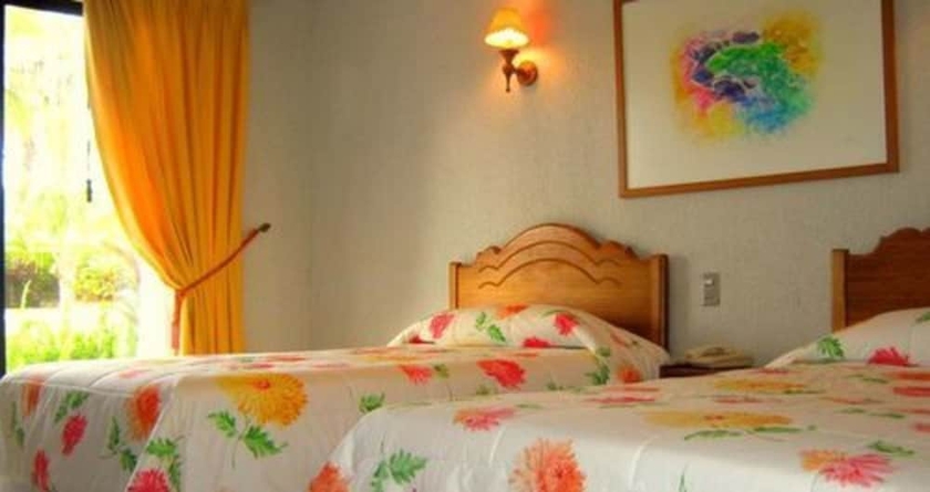 Imagen de la habitación del Hotel Taha Tai. Foto 5