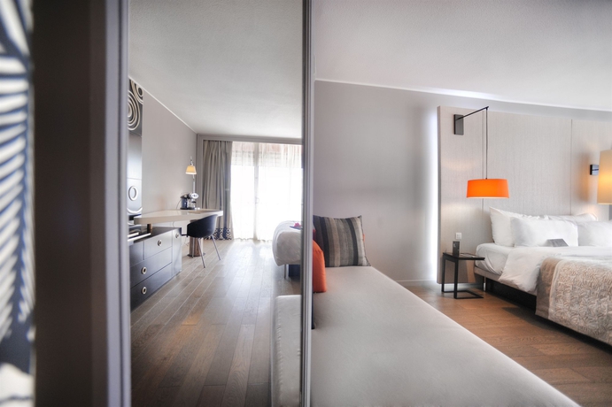 Imagen de la habitación del Hotel Tahiti Ia Ora Beach Resort - Managed By Sofitel. Foto 8