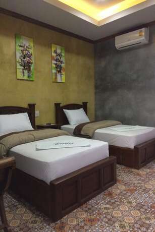 Imagen de la habitación del Hotel Tai Baan Resort. Foto 22