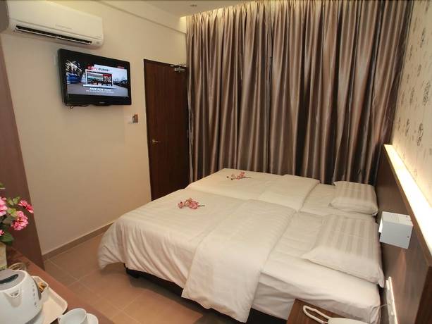 Imagen de la habitación del Hotel Tai Ichi. Foto 13