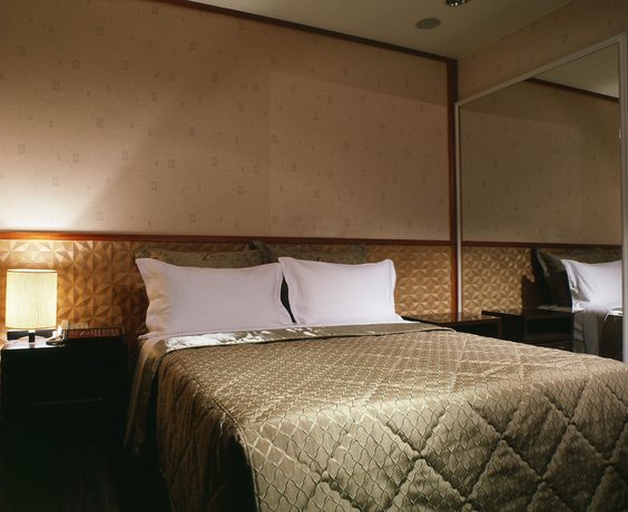 Imagen de la habitación del Hotel Tai Lee. Foto 2
