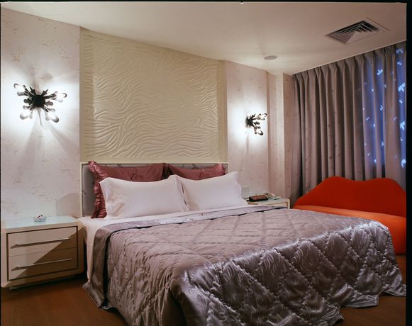 Imagen de la habitación del Hotel Tai Lee. Foto 4