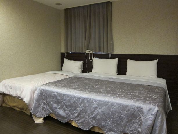 Imagen de la habitación del Hotel Tai Lee. Foto 5
